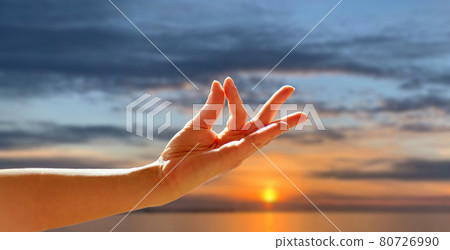 hand of meditating yogi woman showing gyan mudra hand of meditating yogi woman showing gyan mudra 80726990