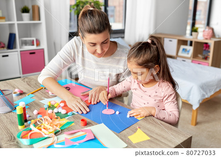 daughter with mother making applique at home daughter with mother making applique at home 80727033