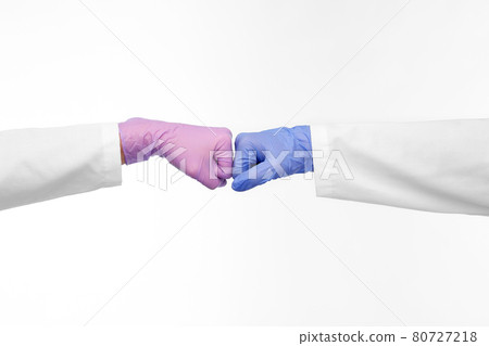 hands of doctors in gloves make fist bump gesture hands of doctors in gloves make fist bump gesture 80727218