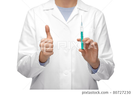 close up of doctor with syringe showing thumbs up close up of doctor with syringe showing thumbs up 80727230