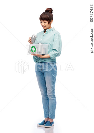 smiling young asian woman sorting metallic waste 80727488