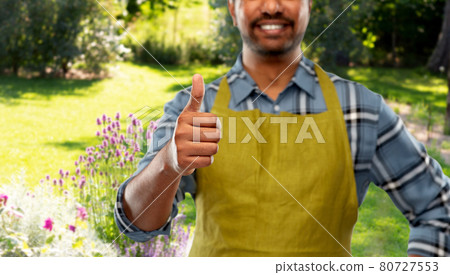 indian male gardener showing thumbs up at garden indian male gardener showing thumbs up at garden 80727553