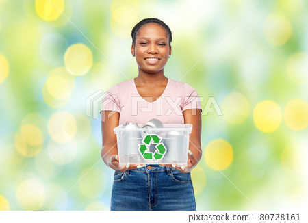african american woman sorting metallic waste african american woman sorting metallic waste 80728161