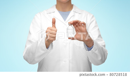 close up of doctor with medicine showing thumbs up 80728518