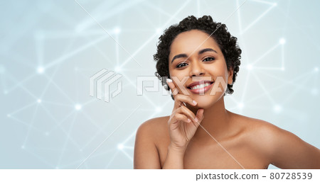young african american woman with moisturizer young african american woman with moisturizer 80728539