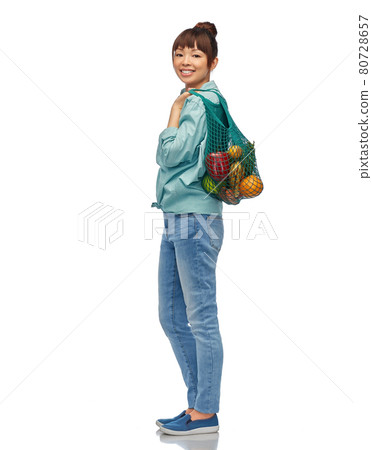 happy asian woman with food in reusable string bag happy asian woman with food in reusable string bag 80728657