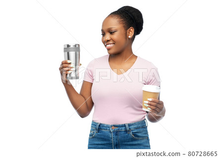 woman with coffee cup and tumbler for hot drinks woman with coffee cup and tumbler for hot drinks 80728665