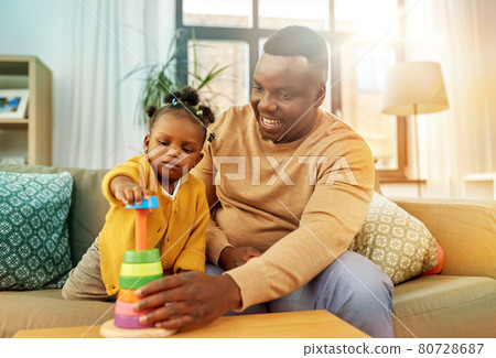 african family playing with baby daughter at home african family playing with baby daughter at home 80728687