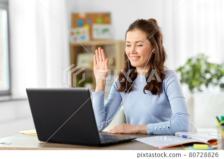 teacher with laptop having online class at home teacher with laptop having online class at home 80728826