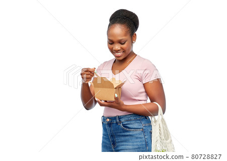 happy woman with reusable string bag eating wok happy woman with reusable string bag eating wok 80728827