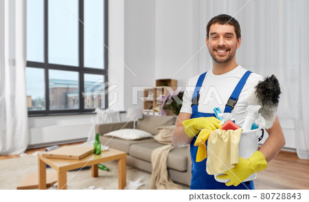 male cleaner with cleaning supplies at home male cleaner with cleaning supplies at home 80728843