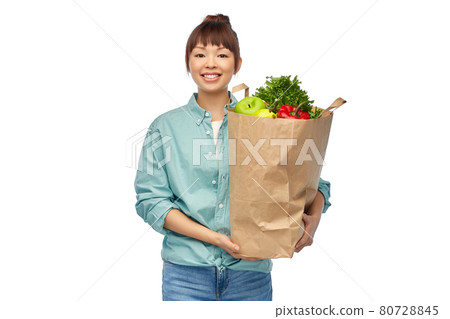 happy asian woman with food in paper shopping bag 80728845