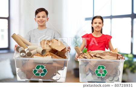 smiling girl and boy sorting paper waste smiling girl and boy sorting paper waste 80728931