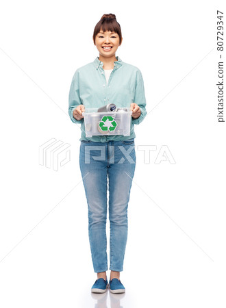 smiling young asian woman sorting metallic waste 80729347