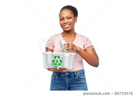 african american woman sorting metallic waste 80729378