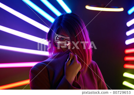 Cyber girl. Beautiful young woman, futuristic style. 80729653