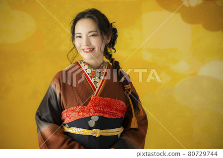A woman with brown furisode A woman with brown furisode 80729744