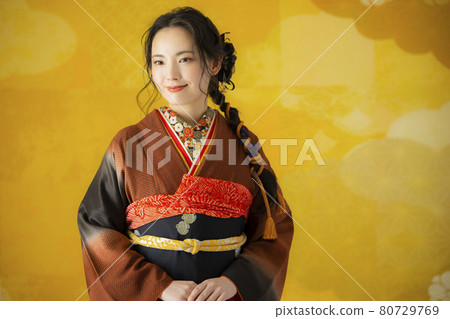 A woman with brown furisode A woman with brown furisode 80729769