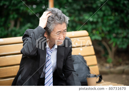 Businessmen worried outdoors 80731670