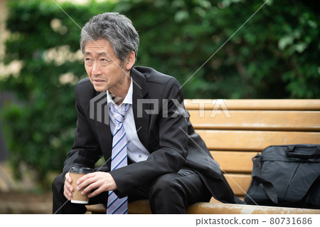 Businessmen worried outdoors Businessmen worried outdoors 80731686