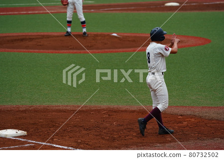 First base runner sending a signal to second base runner First base runner sending a signal to second base runner 80732502