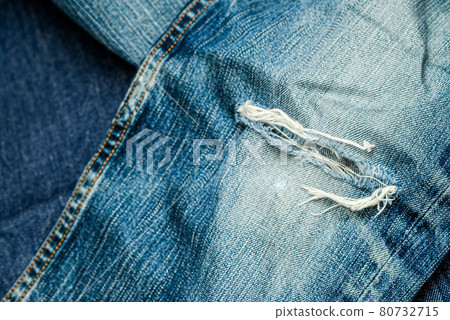 Damaged jeans up photo Damaged jeans up photo 80732715