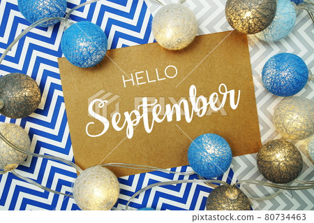 Hello September typography text on paper card with LED cotton balls decoration Hello September typography text on paper card with LED cotton balls decoration 80734463
