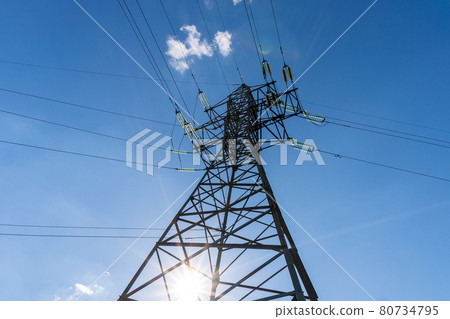 high-voltage power lines. Distribution power plant. high-voltage power transmission tower. Bottom view high-voltage power lines. Distribution power plant. high-voltage power transmission tower. Bottom view 80734795