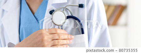 Doctor chest with stethoscope in pocket closeup Doctor chest with stethoscope in pocket closeup 80735355