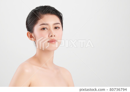 Beautiful young asian woman with clean fresh skin on white background, Face care, Facial treatment, 80736794