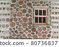 Antique Rustic Cordwood Log Cabin House Wall Background Antique Rustic Cordwood Log Cabin House Wall Background 80736837