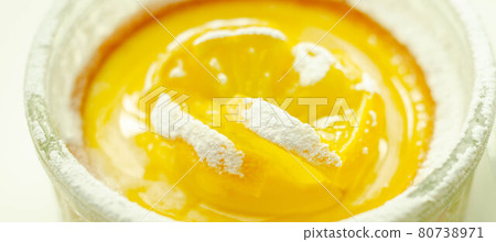 Tarte au Citron deliciously rich and zingy lemon creme encased in crumbly, buttery pastry case gently baked to perfectly complement the creamy filling 80738971