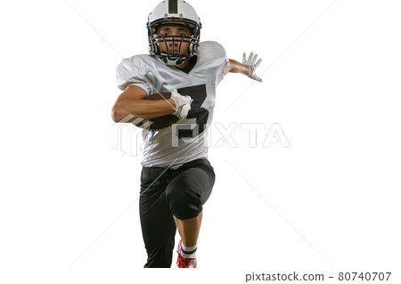 Close-up portrait of American football player in sports equipment, helmet and gloves isolated on white studio background. Concept of sport, competition Close-up portrait of American football player in sports equipment, helmet and gloves isolated on white studio background. Concept of sport, competition 80740707