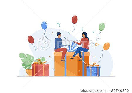 Tiny people sitting on gift box 80740820