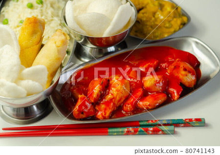 Chinese set, chicken curry, sweet and sour chicken served with egg fried rice, vegetable spring rolls, and prawn crackers Chinese set, chicken curry, sweet and sour chicken served with egg fried rice, vegetable spring rolls, and prawn crackers 80741143