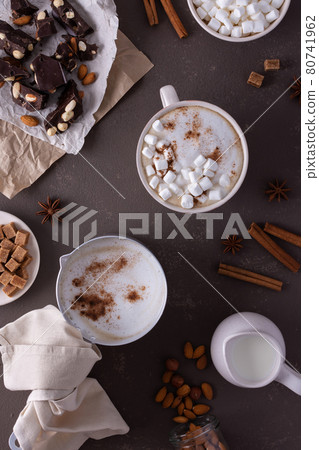 Winter cocoa drink with milk foam in a mug Winter cocoa drink with milk foam in a mug 80741962