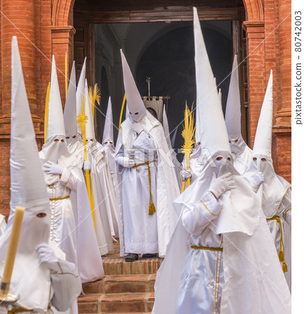 People participating in the Holy Week procession in a Spanish city during Easter People participating in the Holy Week procession in a Spanish city during Easter 80742003