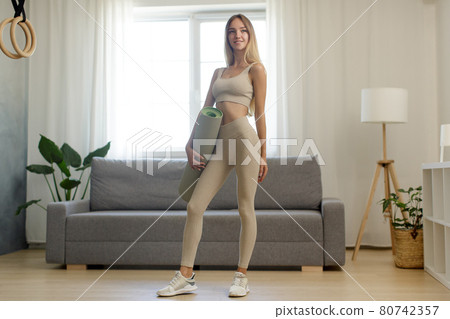 Fit Sports Woman After Training at Home Fit Sports Woman After Training at Home 80742357