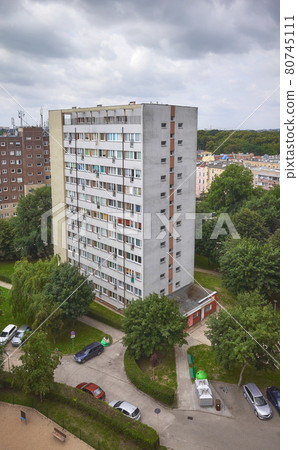 Residential buildings at Niebuszewo district in Szczecin on cloudy day, Poland. 80745111