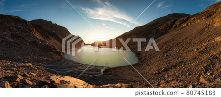 Panoramic View of Vibrant Colorful Glacier Lake up in Rocky Mountains Panoramic View of Vibrant Colorful Glacier Lake up in Rocky Mountains 80745183