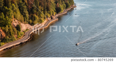 Aerial View from Lions Gate Bridge of Famous Seawall in Stanley Park. Aerial View from Lions Gate Bridge of Famous Seawall in Stanley Park. 80745269
