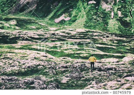 Trail run athlete running on mountain nature background ultra runner on long distance trek. Endurance sport hiker on trek hike. Landscape spring or winter 80745979