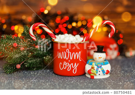 Chocolate with whipped cream in red mug. Christmas time. Chocolate with whipped cream in red mug. Christmas time. 80750481