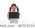 little Asian child show the black board on isolated background 80753534
