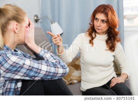 Mom points her daughter to her faults. Mom points her daughter to her faults. 80755191