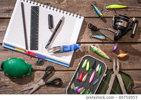 Accessories for fishing on the background of wood. Top view 80758955