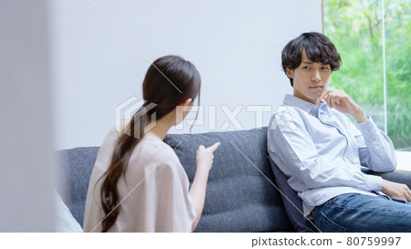 Young couples fighting at home Young couples fighting at home 80759997