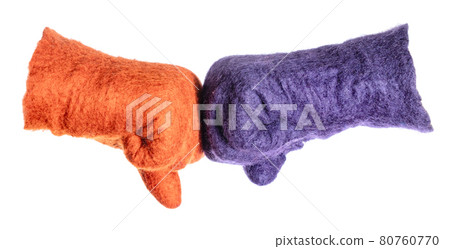 fist bump of orange and purple gloves isolated fist bump of orange and purple gloves isolated 80760770