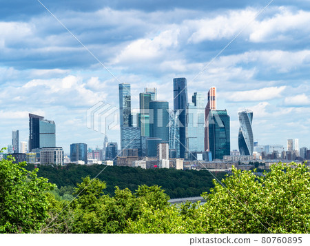 skyscrapers of Moscow-city under dark blue clouds skyscrapers of Moscow-city under dark blue clouds 80760895