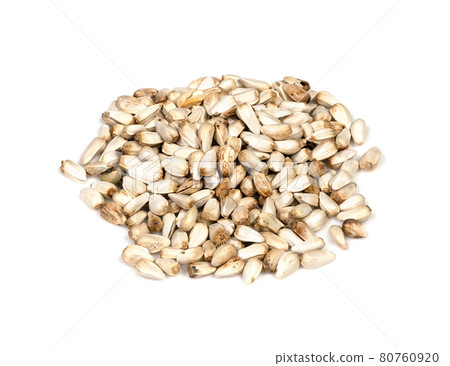 handful of Safflower seeds closeup on white handful of Safflower seeds closeup on white 80760920